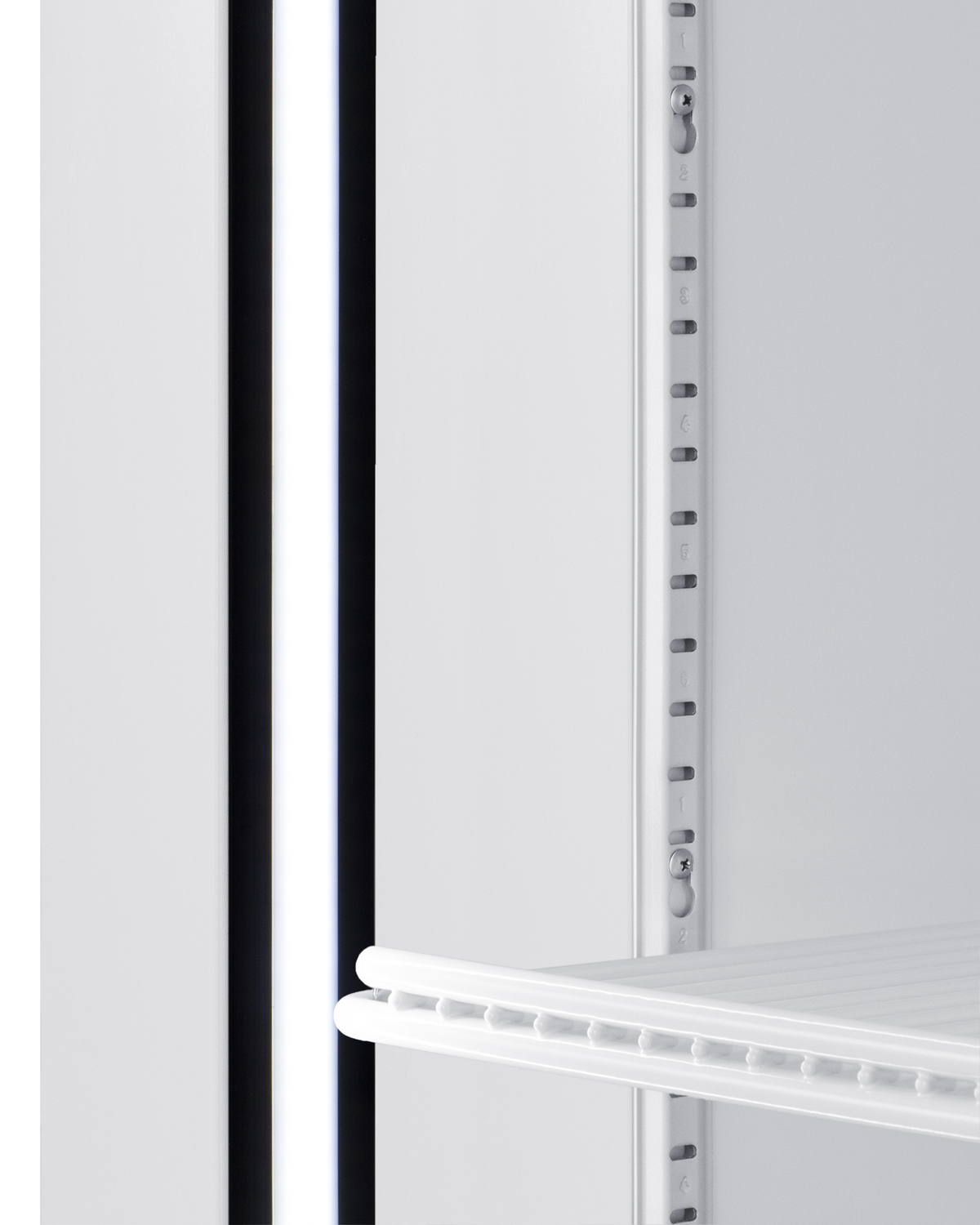 21.34 cu.ft. upright commercial display freezer with self-closing glass door, front lock, and white cabinet